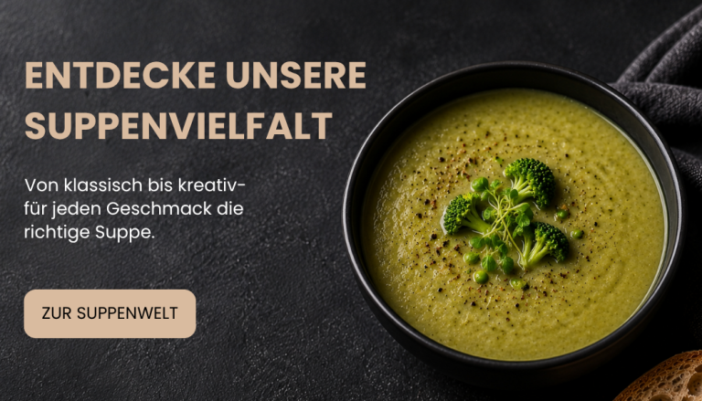 Grüne Suppe in schwarzem Schüssel, garniert mit frischem Gemüse.
